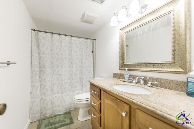 bathroom featuring tile patterned floors, a shower with curtain, toilet, and vanity