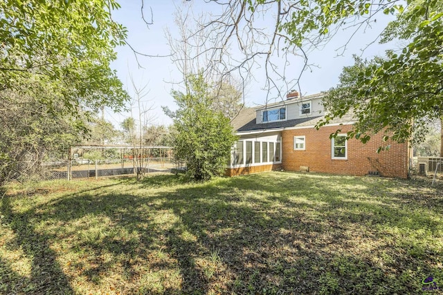 view of yard featuring fence