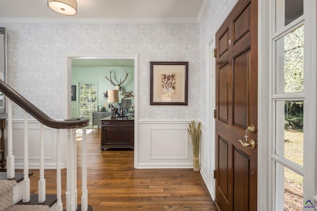 entryway featuring stairway, a wainscoted wall, and wallpapered walls