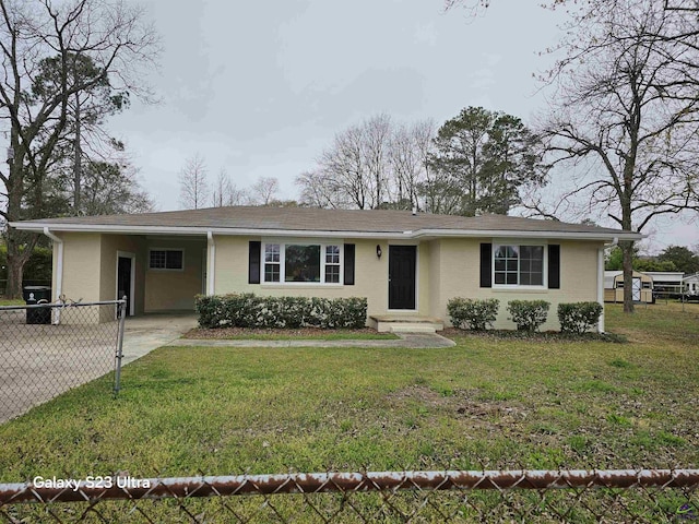 single story home with an attached carport, concrete driveway, a front lawn, and fence