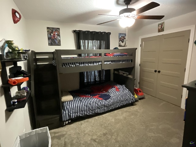 bedroom with a closet and carpet flooring