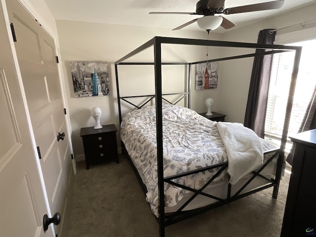 carpeted bedroom featuring a ceiling fan