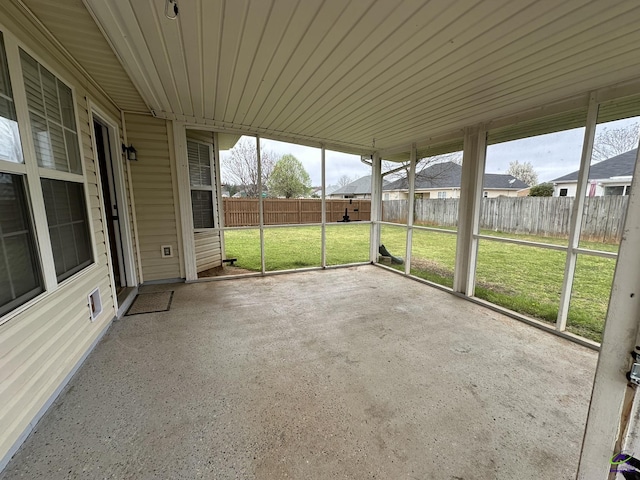 unfurnished sunroom with plenty of natural light