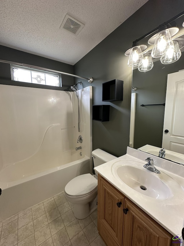 full bath featuring vanity, a textured ceiling, visible vents, shower / bath combination, and toilet