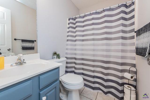 bathroom featuring tile patterned floors, toilet, a shower with shower curtain, and vanity