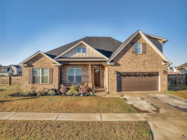 craftsman-style house with brick siding, board and batten siding, and fence