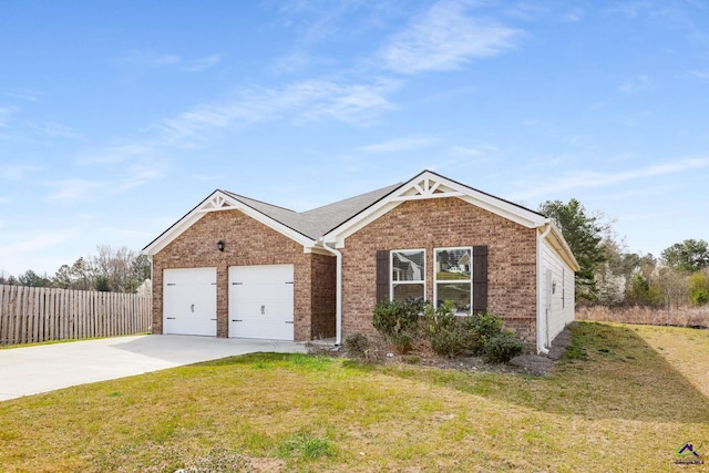 ranch-style home featuring a front yard, fence, concrete driveway, a garage, and brick siding