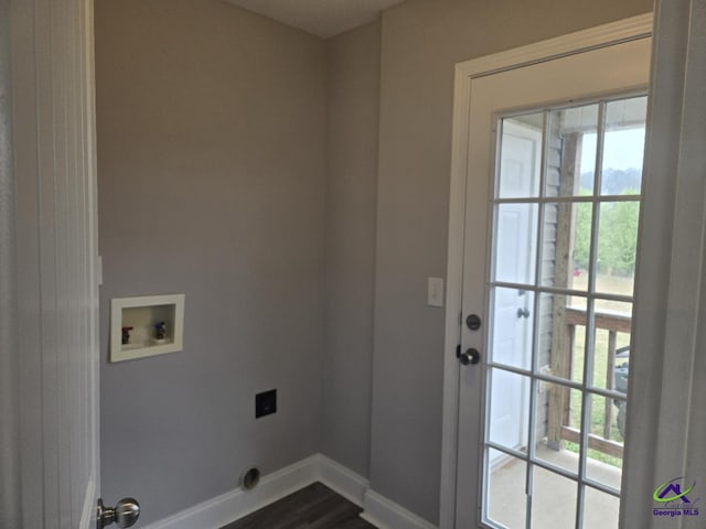 laundry room with hookup for a washing machine, dark wood-style floors, baseboards, laundry area, and electric dryer hookup