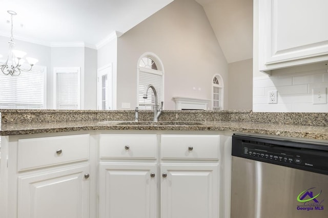 kitchen with a chandelier, dishwasher, white cabinets, stone countertops, and a sink