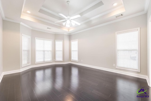 unfurnished room with baseboards, a raised ceiling, ceiling fan, and dark wood-style flooring