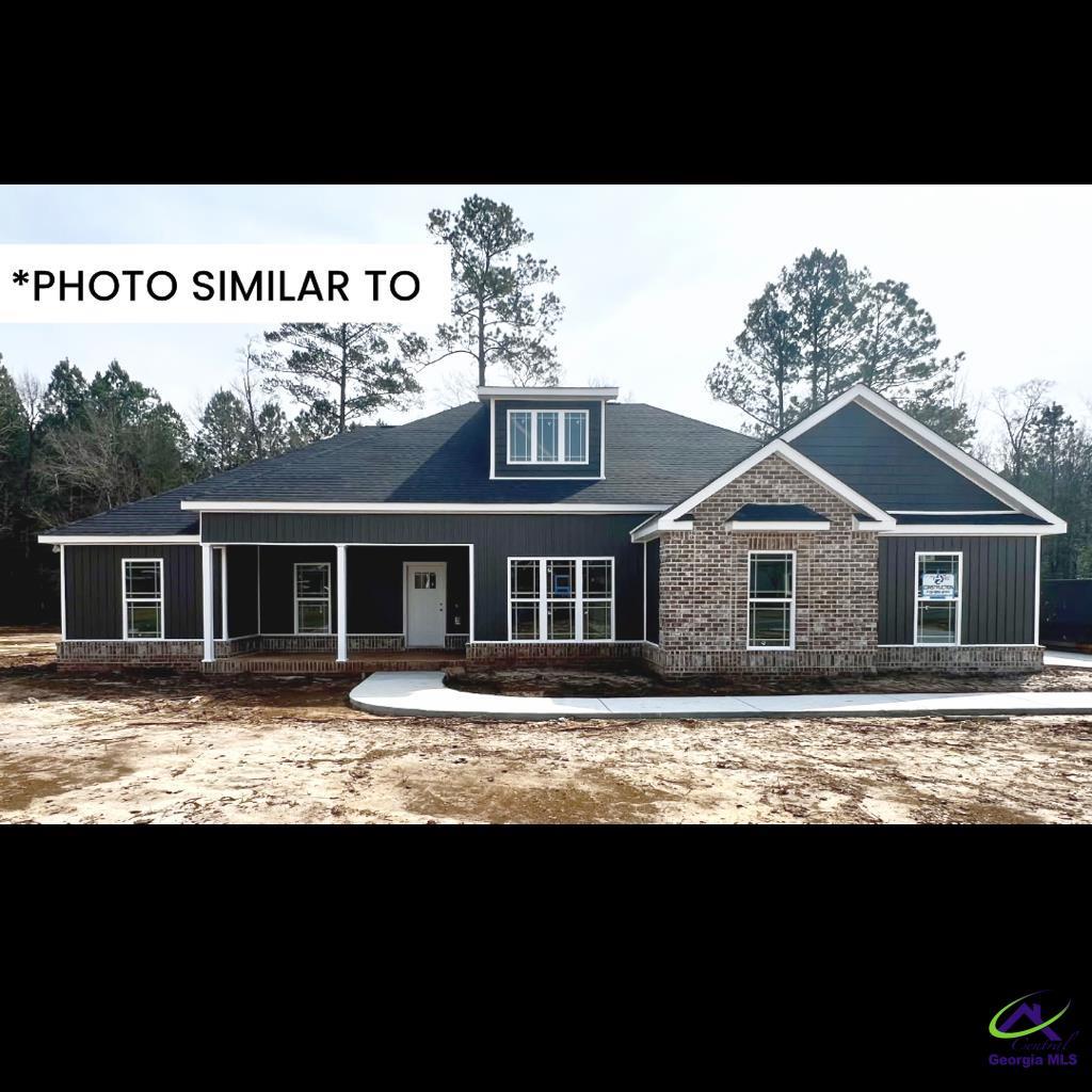 craftsman-style home featuring board and batten siding and covered porch