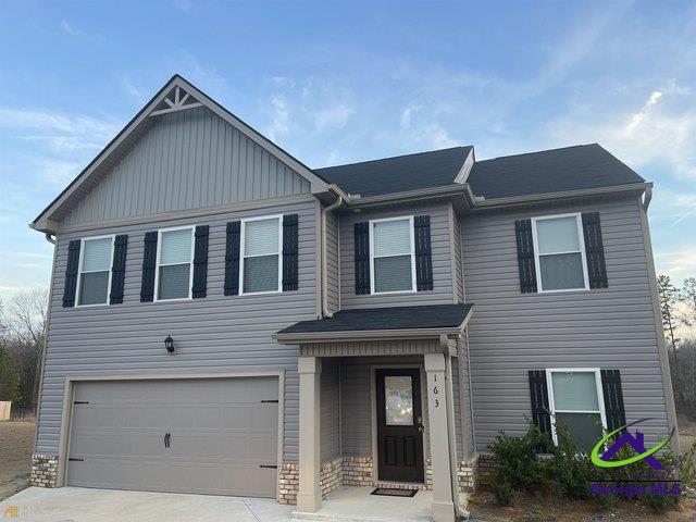 163 Goodall Woods Rd, Macon, GA 31216 - view of front facade featuring concrete driveway and an attached garage