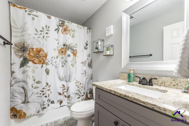 bathroom with toilet, vanity, a textured ceiling, and shower / bathtub combination with curtain