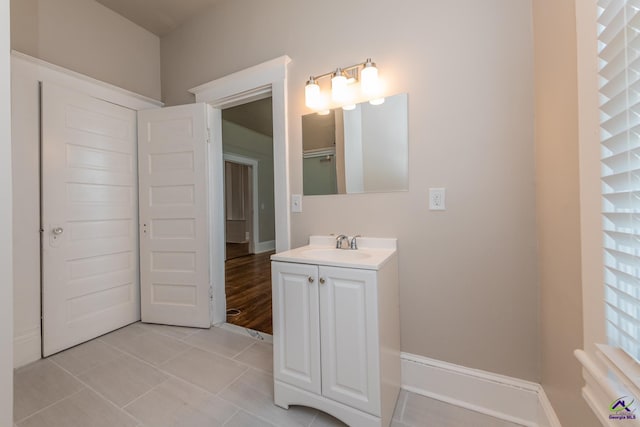 bathroom featuring tile patterned floors and vanity