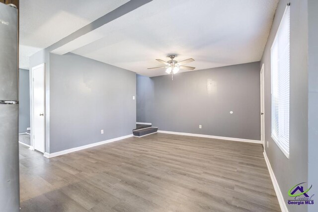 127 Stoneridge Dr, Warner Robins, GA 31088 - spare room with baseboards, wood finished floors, and ceiling fan