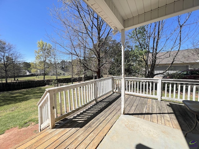 deck featuring a lawn