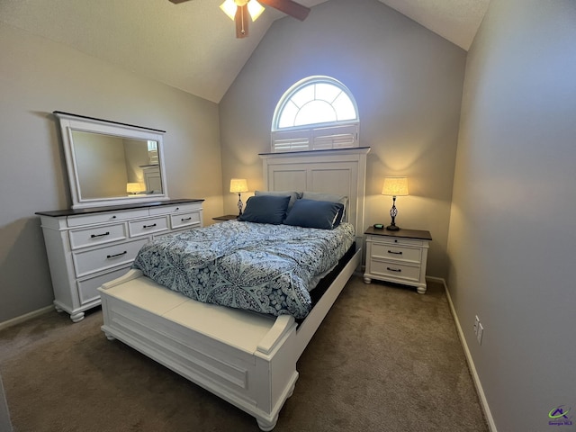 bedroom featuring lofted ceiling, a ceiling fan, baseboards, and dark carpet