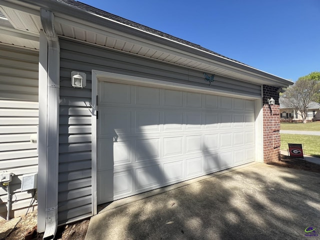 garage featuring driveway