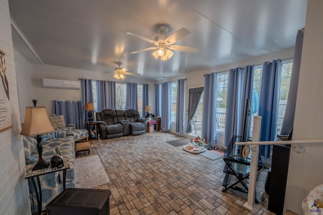 living area with brick floor, a ceiling fan, and a wall mounted AC