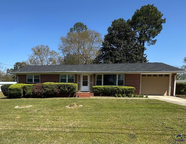 78 Duncan St, Fort Valley, GA 31030 - single story home with a garage, brick siding, and a front yard