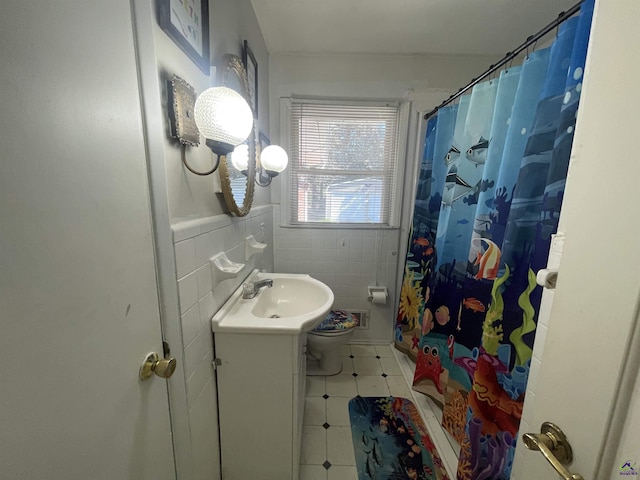 78 Duncan St, Fort Valley, GA 31030 - bathroom featuring vanity, tile walls, and curtained shower
