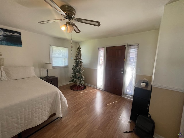 78 Duncan St, Fort Valley, GA 31030 - bedroom with wood finished floors and a ceiling fan