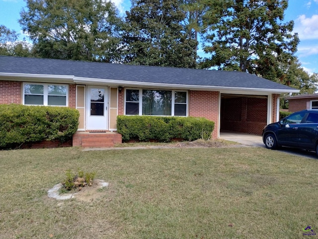78 Duncan St, Fort Valley, GA 31030 - single story home featuring an attached garage, brick siding, and a front lawn