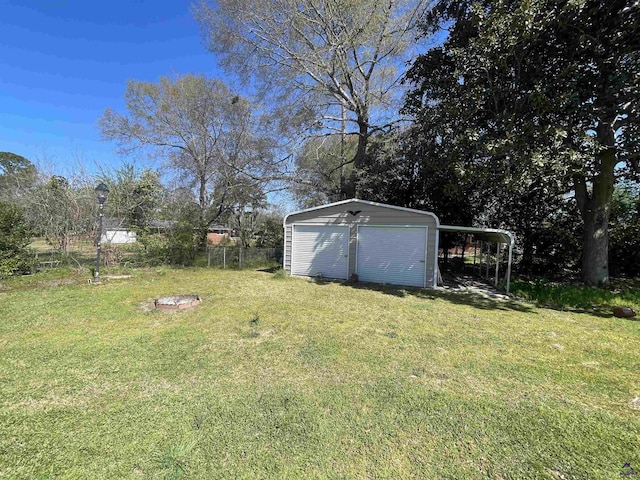 78 Duncan St, Fort Valley, GA 31030 - view of yard with a shed and a garage