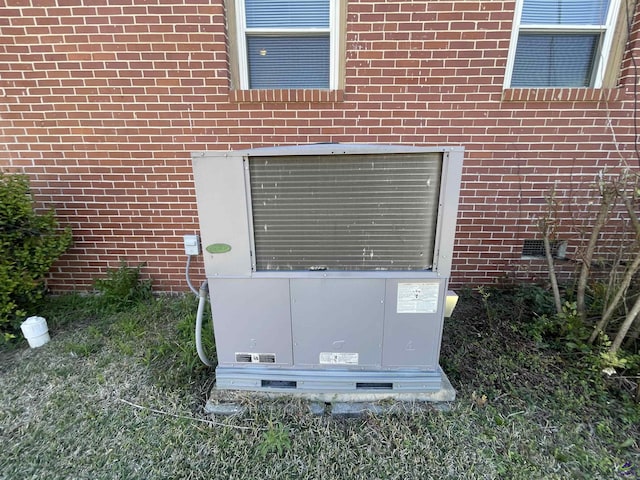 78 Duncan St, Fort Valley, GA 31030 - exterior view of a cooling unit and crawl space