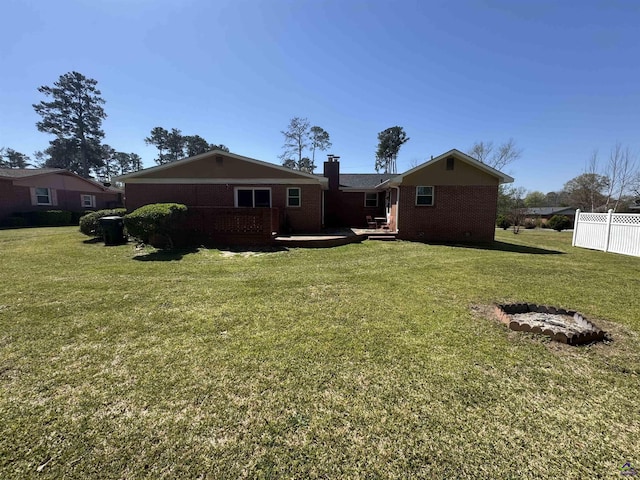 78 Duncan St, Fort Valley, GA 31030 - back of property featuring brick siding and a chimney