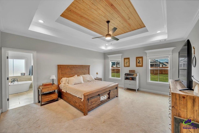 bedroom featuring crown molding, baseboards, recessed lighting, light carpet, and a tray ceiling