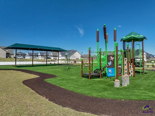 community play area with a lawn