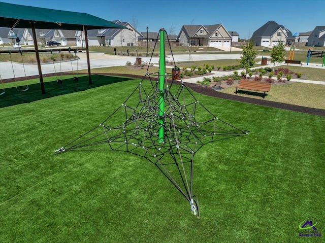 surrounding community with a residential view, playground community, and a lawn