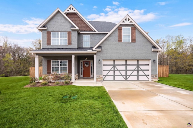 116 Hidesta Ct, Kathleen, GA 31047 - craftsman-style house featuring concrete driveway, fence, an attached garage, and a front lawn