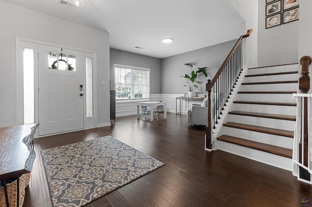 116 Hidesta Ct, Kathleen, GA 31047 - entrance foyer featuring a decorative wall, visible vents, stairs, wood finished floors, and wainscoting