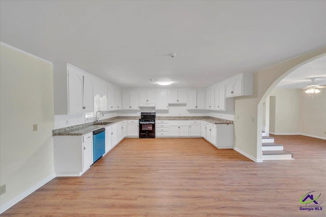 kitchen featuring dishwasher, a sink, black range, and light wood-type flooring