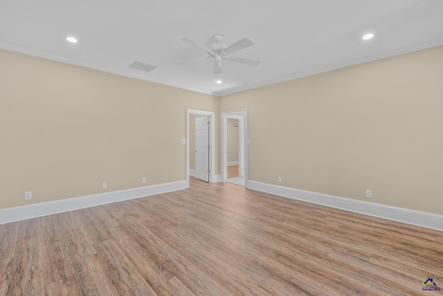 spare room with baseboards, light wood-style flooring, recessed lighting, and a ceiling fan