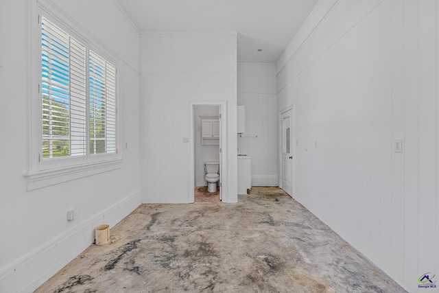 unfurnished bedroom featuring ensuite bathroom