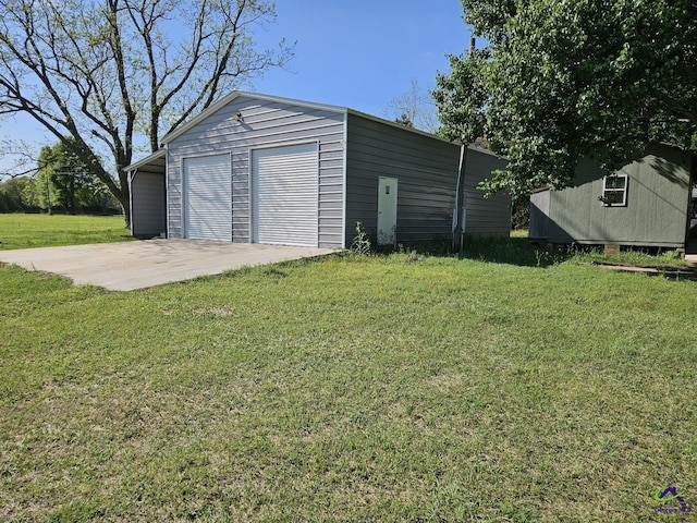 garage featuring a detached garage