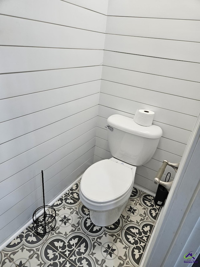 bathroom featuring toilet and tile patterned floors