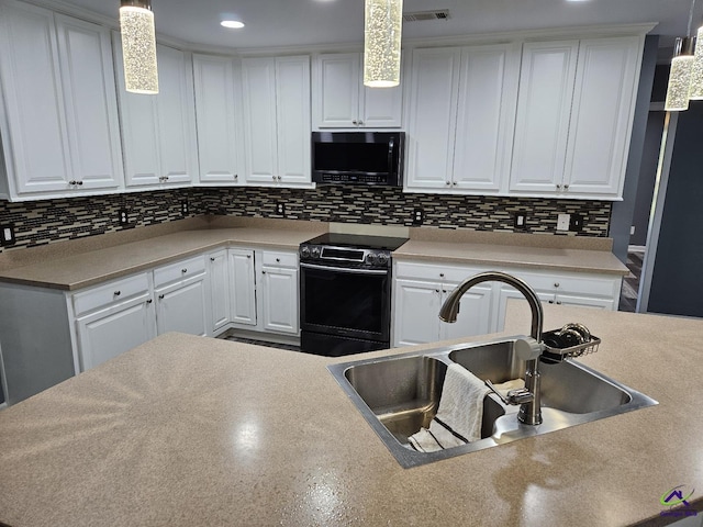 kitchen featuring a sink, decorative backsplash, electric stove, and white cabinets