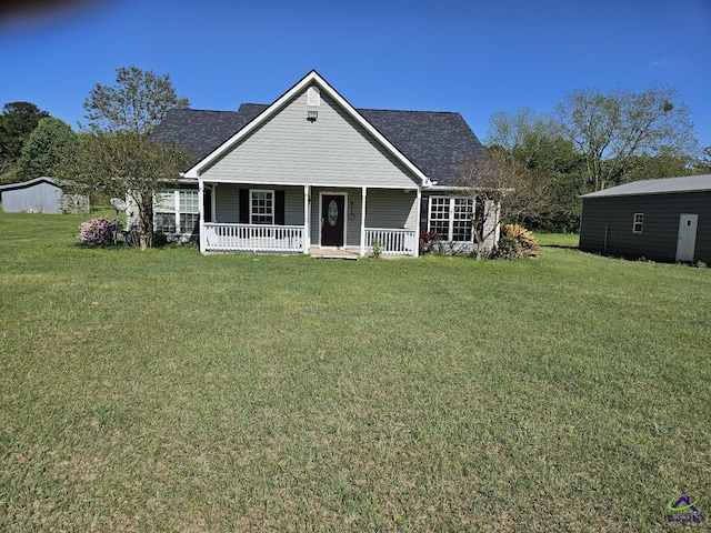 view of front of home with a porch and a front lawn