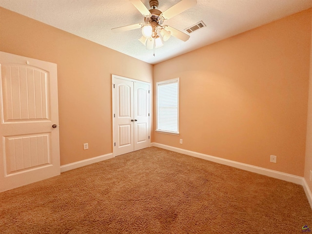 100 Northumberland Way, Warner Robins, GA 31088 - unfurnished bedroom with light carpet, baseboards, a closet, and a ceiling fan