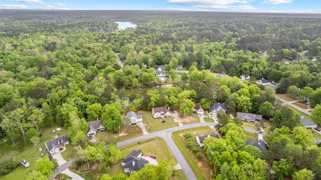 bird's eye view featuring a residential view and a view of trees