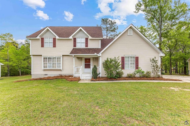 traditional-style home with crawl space, roof with shingles, and a front yard