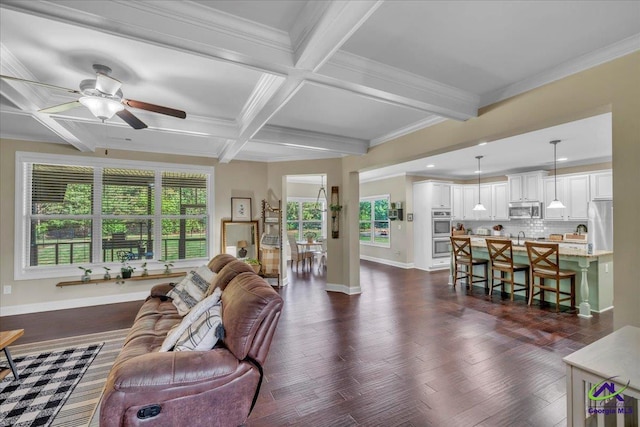 159 Feather Ln, Jackson, GA 30233 - living room featuring dark wood-type flooring, baseboards, a ceiling fan, and beam ceiling