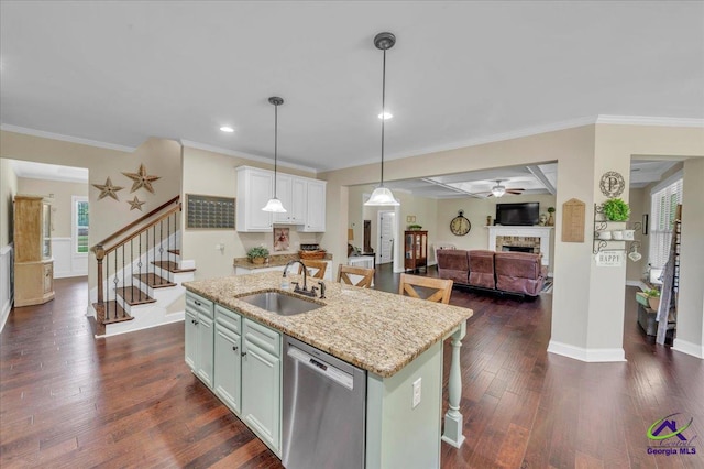 159 Feather Ln, Jackson, GA 30233 - kitchen featuring ceiling fan, a fireplace, dishwasher, a sink, and open floor plan