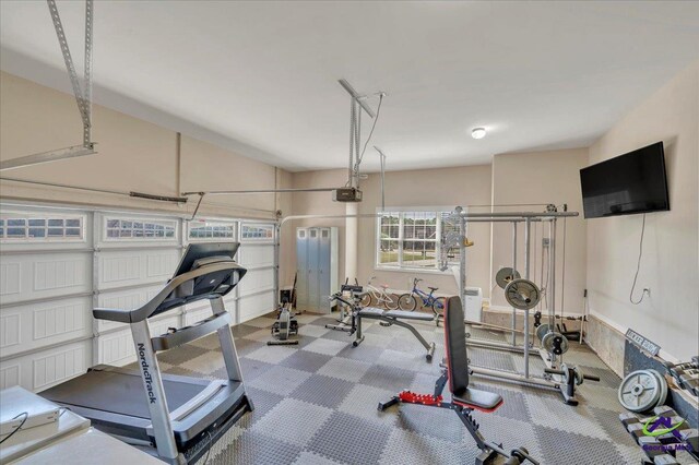 159 Feather Ln, Jackson, GA 30233 - exercise room with a garage and carpet