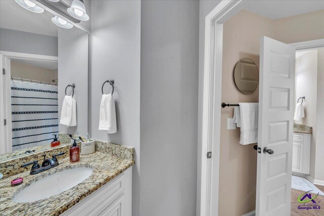 159 Feather Ln, Jackson, GA 30233 - full bath featuring vanity and baseboards