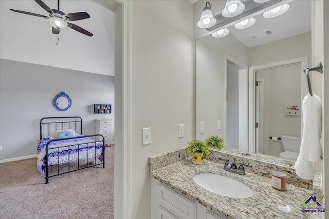 159 Feather Ln, Jackson, GA 30233 - bathroom with visible vents, baseboards, toilet, ceiling fan, and vanity